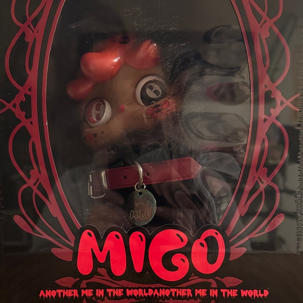 Migo Collectible Figure with Red Accents, New in box